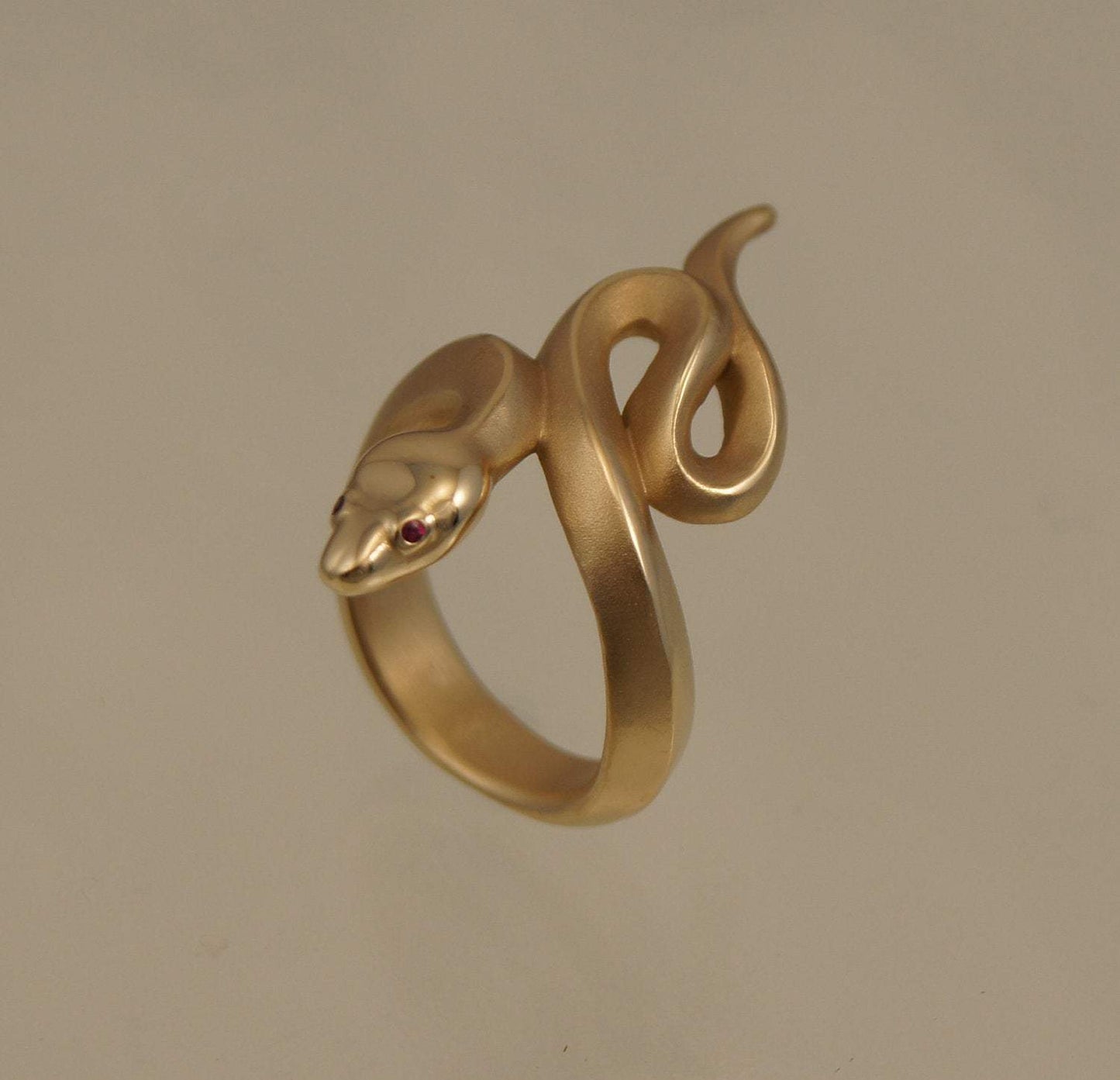 Boa Snake Ring. Coiled snake ring. Bronze Snake Ring. Snake Ring. Michael Tatom Jewelry. Sorrel Sky Gallery. Sorrel Sky Jewelry.