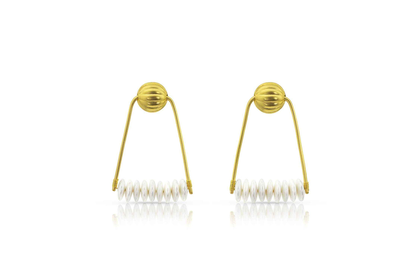 Inspired by a famous necklace from Ancient Egypt’s 21st Dynasty, we have combined the melon motif with freshwater pearl, to create a statement earring reminiscent of another era. 22k yellow gold, 2 1/2" long