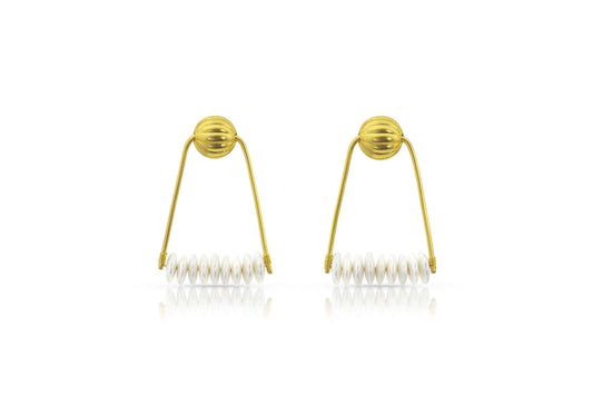 Inspired by a famous necklace from Ancient Egypt’s 21st Dynasty, we have combined the melon motif with freshwater pearl, to create a statement earring reminiscent of another era. 22k yellow gold, 2 1/2" long