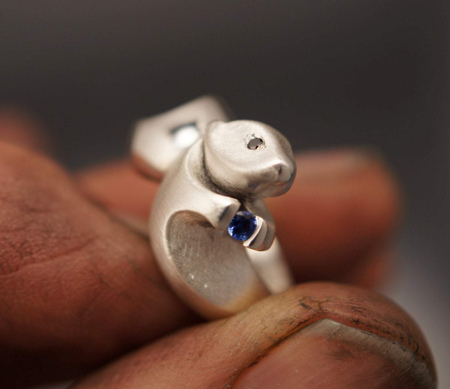 Sea Otter ring with Gemstones. Michael Tatom Jewelry. Sorrel Sky Gallery.