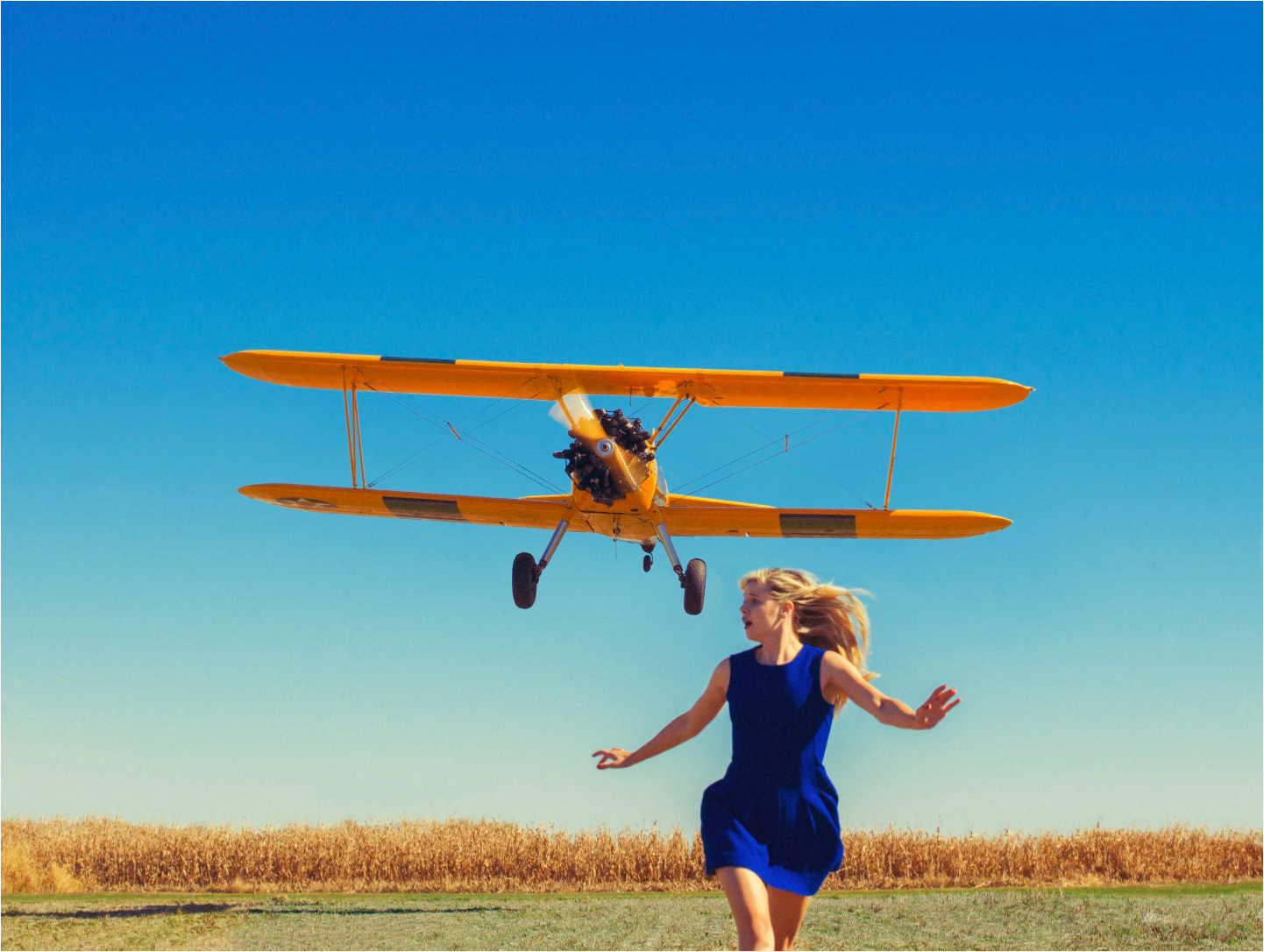 Girl Running From Plane-Photographic Print-Tyler Shields-Sorrel Sky Gallery