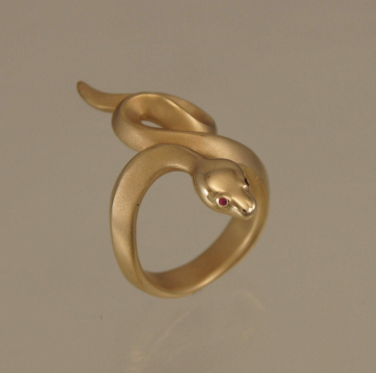 Boa Snake Ring. Coiled snake ring. Bronze Snake Ring. Snake Ring. Michael Tatom Jewelry. Sorrel Sky Gallery. Sorrel Sky Jewelry.