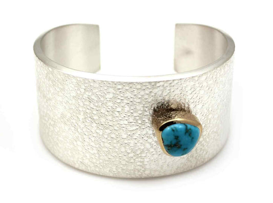 Sterling silver with 18K gold bezel and natural Lone Mnt turquoise stone, 1 1/2" wide, size 6 1/2