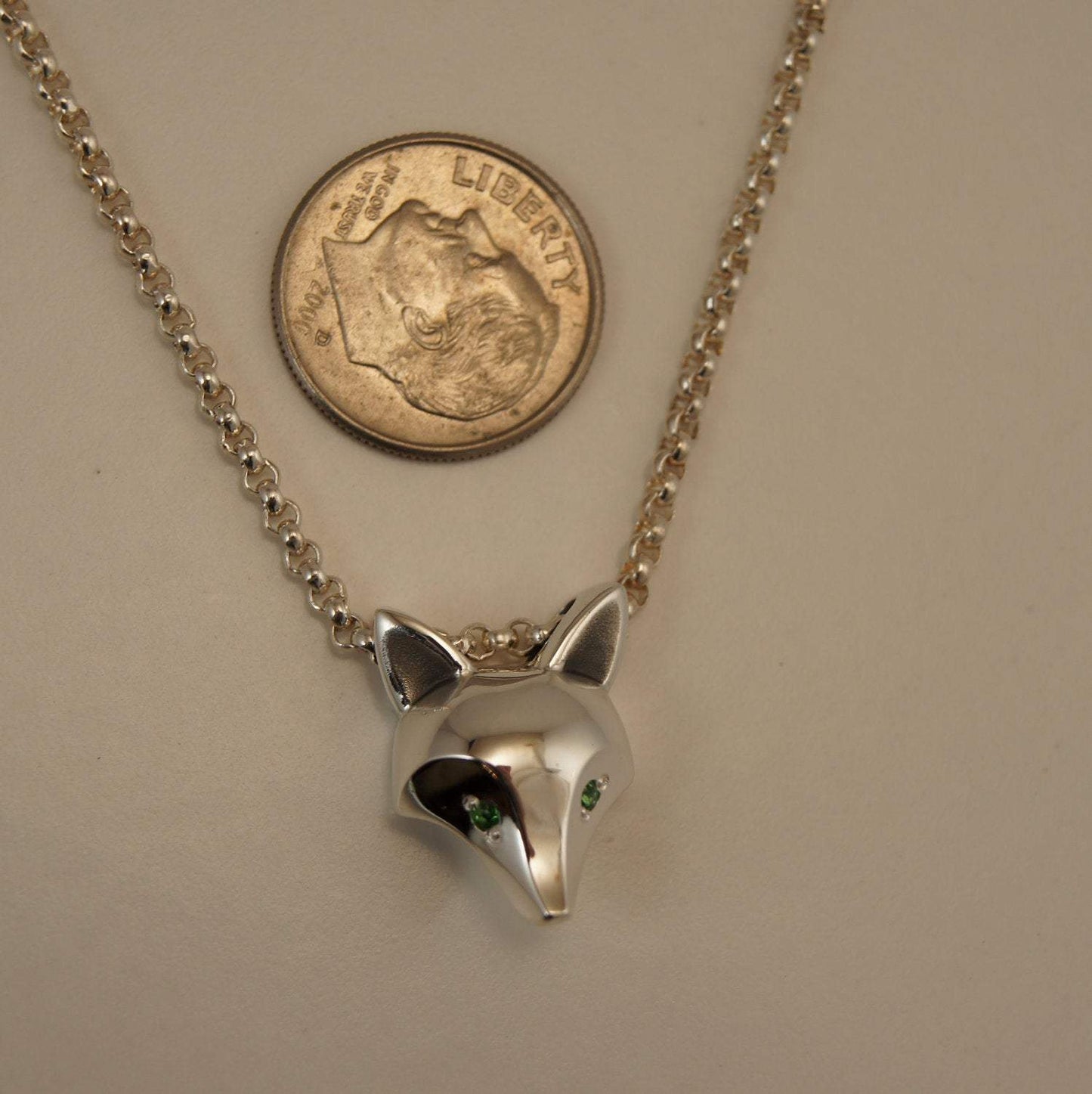Fox Head Necklace. About Dime Sized made from Bronze, Sterling Silver with a Satin or High Polish Finish. Gemstone Eyes - lots of colors available. Jewelry by Sculpture artist Michael Tatom at Sorrel Sky Gallery. Fox Jewelry.