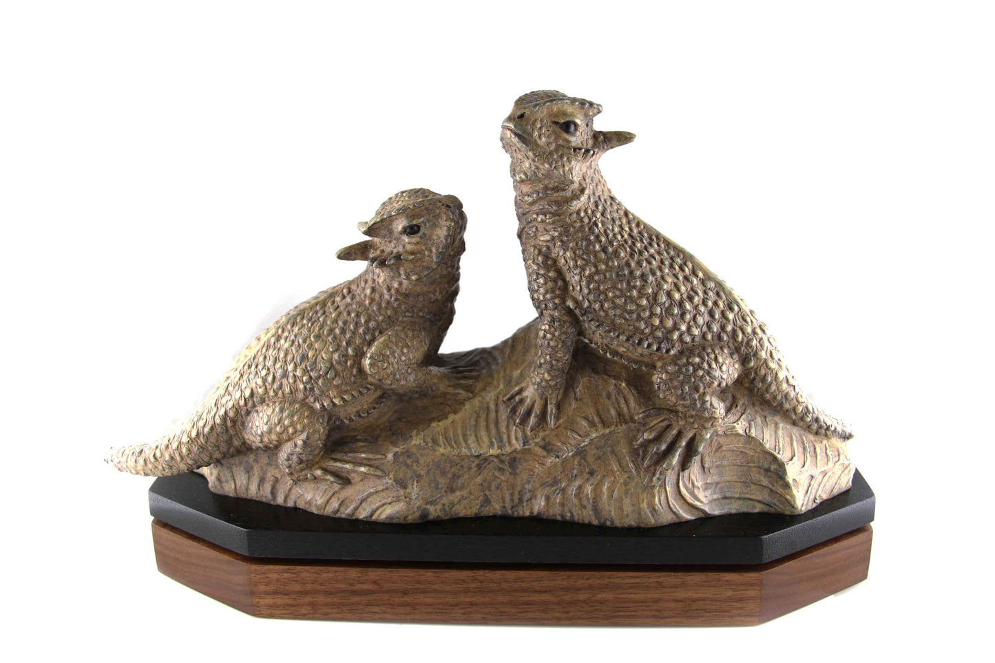 Two lizards sunning themselves.  Bronze by Gerald Balciar
