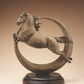 Bronze sculpture of a leaping horse and moon eclipse