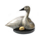 A Gray swan nestling a golden egg. Bronze sculpture by Tim Cherry. Sorrel Sky Gallery.